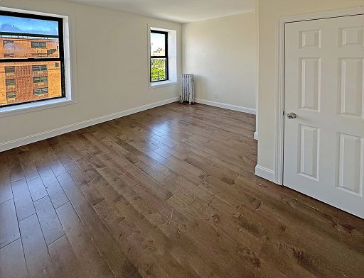 Bedroom with hardwood floors